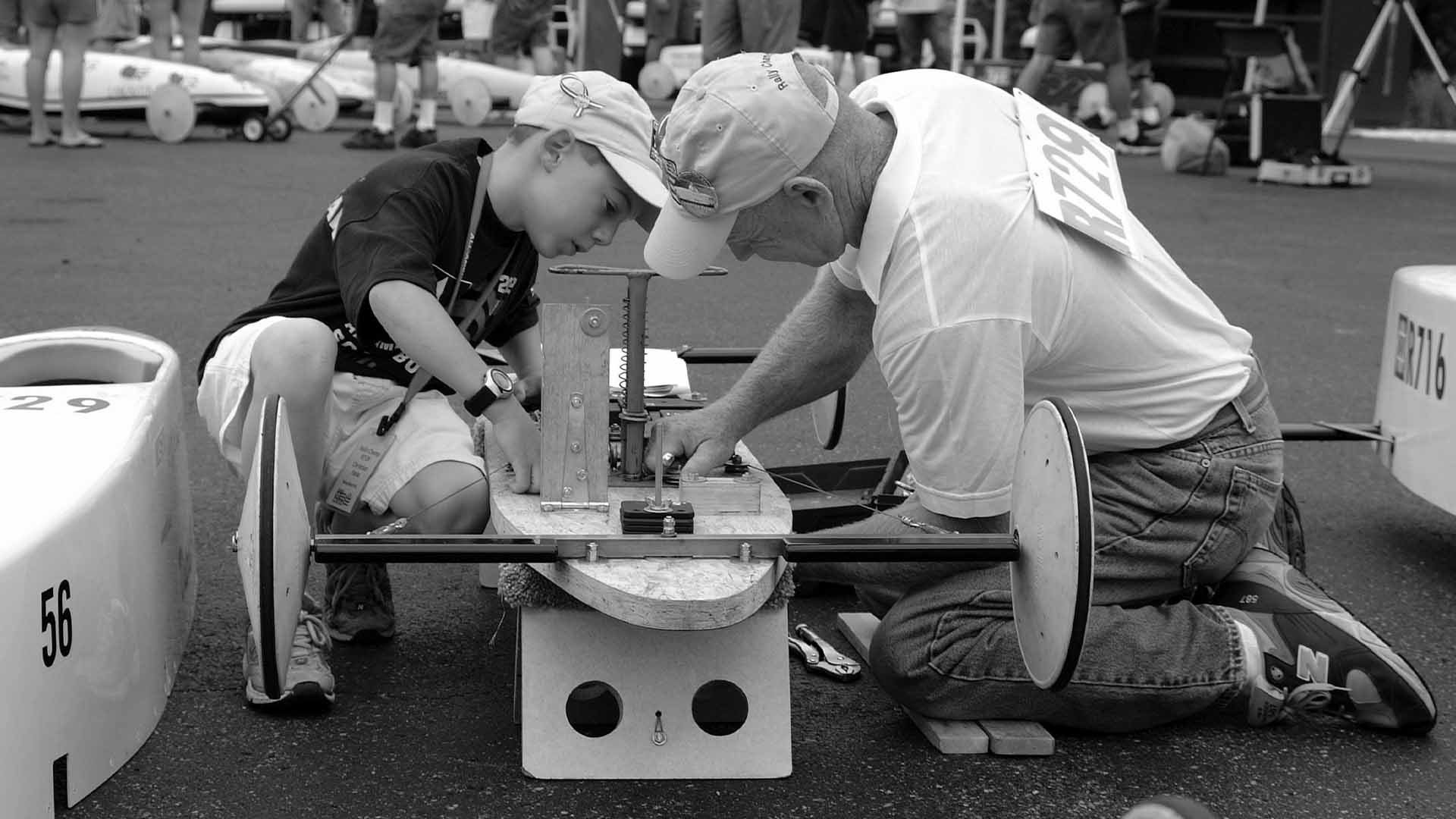 Three cars taking off from the starting line